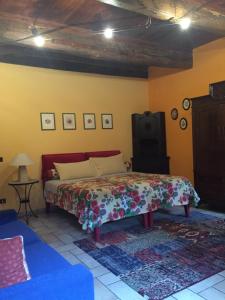 Postel nebo postele na pokoji v ubytování Cascina Baresane