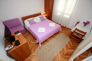 Postel nebo postele na pokoji v ubytování Villa Grozdic