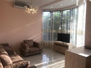 TV a/nebo společenská místnost v ubytování Guest House Kobuleti