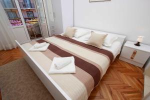 Postel nebo postele na pokoji v ubytování Villa Grozdic