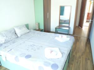 Cama o camas de una habitación en Sofia Apartments in Sunny Residence