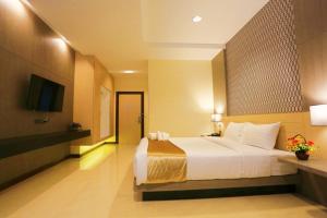 Postel nebo postele na pokoji v ubytování iBiz Boutique Hotel