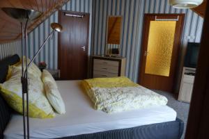 Postel nebo postele na pokoji v ubytování Orwa Vendégház