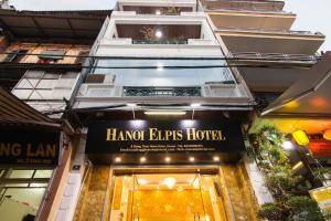 un edificio con un cartel que lee Hotel épico harriott en Hanoi Elpis Hotel, en Hanói