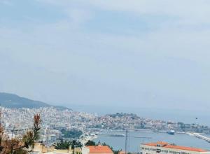 a view of a city and a body of water at K&B Luxury Studios in Kavála