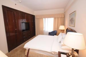 TV a/nebo společenská místnost v ubytování Cairo World Trade Center Hotel & Residences