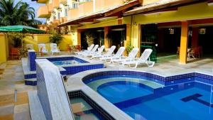 A piscina localizada em Hotel Canto da Riviera ou nos arredores