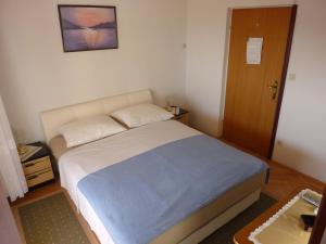 Postel nebo postele na pokoji v ubytování Guest House Mireja