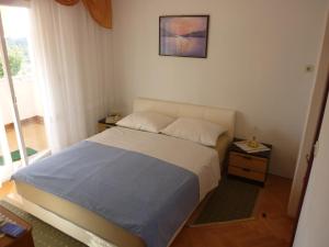 Postel nebo postele na pokoji v ubytování Guest House Mireja