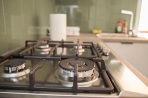 A kitchen or kitchenette at Gazi Area close to Metro
