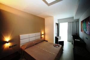 Postelja oz. postelje v sobi nastanitve White Hotel
