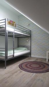 Posteľ alebo postele v izbe v ubytovaní Apartament Homole A6