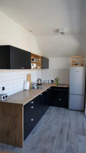 Kuchyňa alebo kuchynka v ubytovaní Apartament Homole A6
