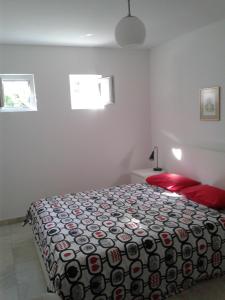 Postel nebo postele na pokoji v ubytování Apartment Ika