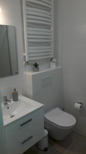 Fotografia z galérie ubytovania Apartament Miodowy Dom v destinácii Kołobrzeg