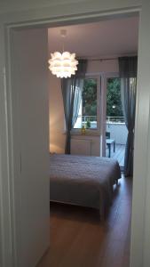Fotografia z galérie ubytovania Apartament Miodowy Dom v destinácii Kołobrzeg