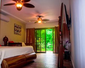 Rúm í herbergi á Hotel-Boutique Patampa