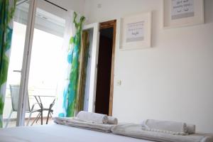 Postel nebo postele na pokoji v ubytování Apartments Milas