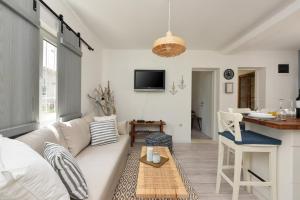 Televízia a/alebo spoločenská miestnosť v ubytovaní Apartment Nemo