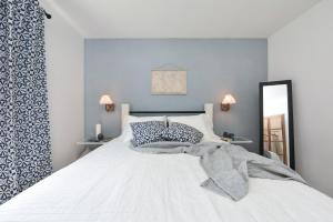 Posteľ alebo postele v izbe v ubytovaní Apartment Nemo
