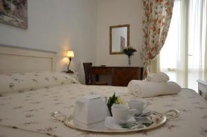 Posteľ alebo postele v izbe v ubytovaní Catarin Comfort Rooms