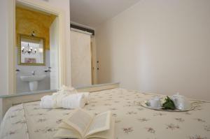 Posteľ alebo postele v izbe v ubytovaní Catarin Comfort Rooms + 37 fotografií