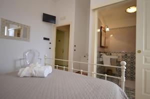 Posteľ alebo postele v izbe v ubytovaní Catarin Comfort Rooms