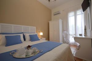 Posteľ alebo postele v izbe v ubytovaní Catarin Comfort Rooms
