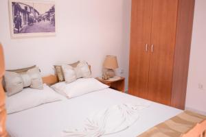 Un pat sau paturi într-o cameră la Villa Guci