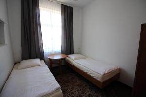 Posteľ alebo postele v izbe v ubytovaní Dom wypoczynkowy Szarotka&Krokus