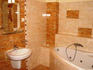 Koupelna v ubytování Hotel Boss
