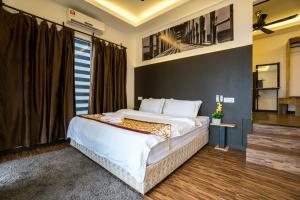 Ein Bett oder Betten in einem Zimmer der Unterkunft The Barat Tioman Beach Resort