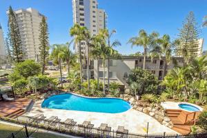 an image of a swimming pool at a resort at Baronnet Apartments in Gold Coast
