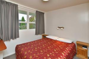 Postel nebo postele na pokoji v ubytování Wayside Motel
