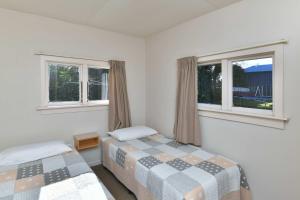 Postel nebo postele na pokoji v ubytování Wayside Motel