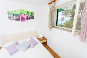 Postel nebo postele na pokoji v ubytování Holiday home Marija
