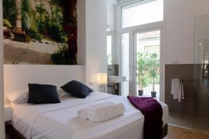 Postel nebo postele na pokoji v ubytování FLORIT FLATS - Serranos Apartment