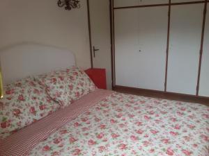 Ein Bett oder Betten in einem Zimmer der Unterkunft Gli Abeti