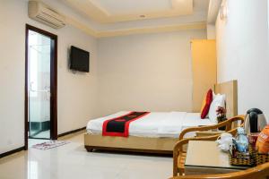 Cama ou camas em um quarto em Le Duong Hotel