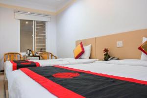 Postel nebo postele na pokoji v ubytování Le Duong Hotel
