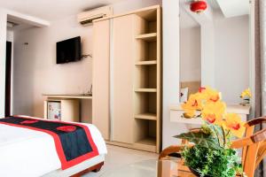 Postel nebo postele na pokoji v ubytování Le Duong Hotel