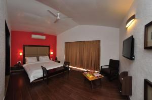 Postel nebo postele na pokoji v ubytování Treasure Island Resorts Lonavala
