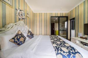 Kama o mga kama sa kuwarto sa Xing Yu Legend Service Apartment Canton Fair Branch