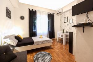 TV a/nebo společenská místnost v ubytování Lucky Rooms