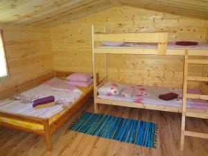 Postel nebo postele na pokoji v ubytování Järve Cottages