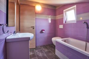 Kúpeľňa v ubytovaní Apartmani B&B