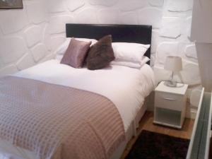 Posteľ alebo postele v izbe v ubytovaní Finn MacCools Public House & Guest Inn