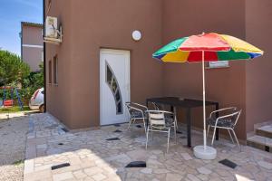 Patio alebo iná vonkajšia časť ubytovania Apartmani B&B