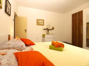 Postel nebo postele na pokoji v ubytování Apartment Luciano 1540