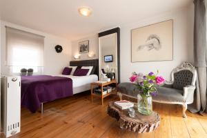 Postel nebo postele na pokoji v ubytování B&B Montenakerhof + 28 fotografií